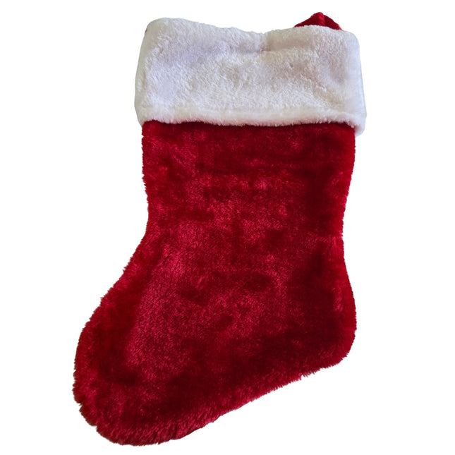 Studio product view of red plush Christmas stocking with white faux fur cuff on a white background